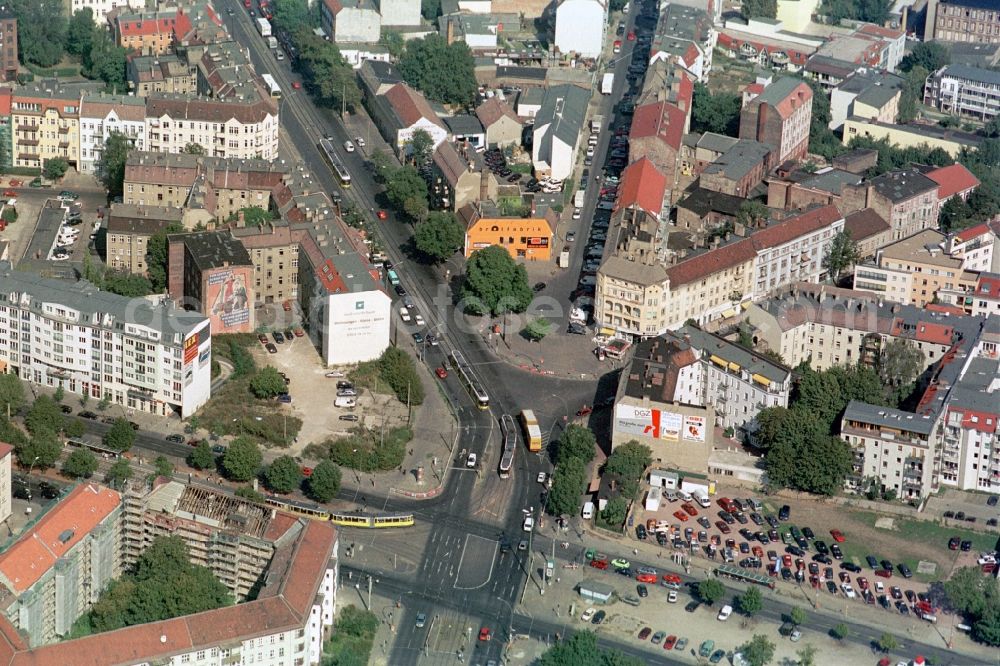 Berlin from above - The transport hub Prenzlauer Allee, Ostseestrasse, Wisbyer-Strasse is located at the intersection of city districts of Berlin-Prenzlauer-Berg and Berlin-Weissensee. Well the facade of the youth club Brotfabrik, a leading arts and cultural center of the capital city lights