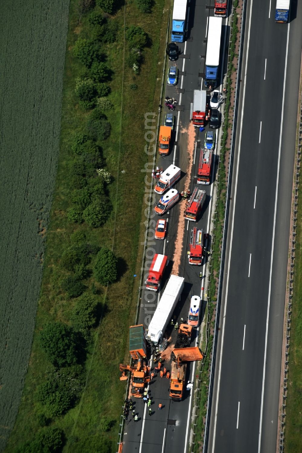 Aerial photograph Plötzkau - Traffic accident with highway traffic jam on the route of BAB A14 by a truck lorry in Ploetzkau in the state Saxony-Anhalt