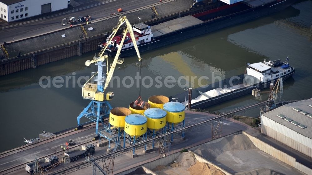 Andernach from the bird's eye view: Loading activity on a ship with a crane in the Rhine port in Andernach in the state Rhineland-Palatinate, Germany