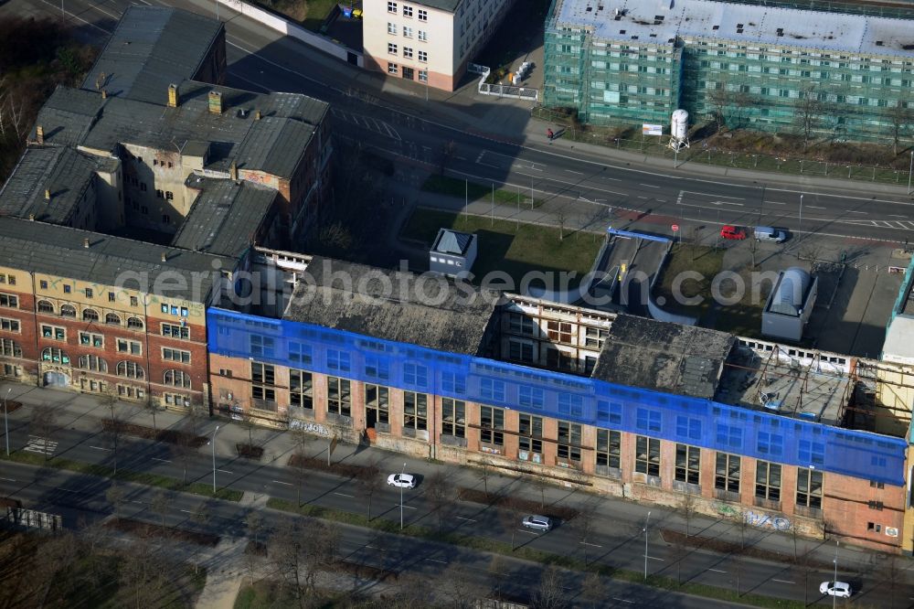 Leipzig from the bird's eye view: View of the abandoned building complex Bugra Messehaus at Gerichtsweg in Leipzig in Saxony. The building was the venue of the book trade and graphics fair in 1914 and was then used as a convention and exhibition center. The building is currently unused and heavily threatened by decay