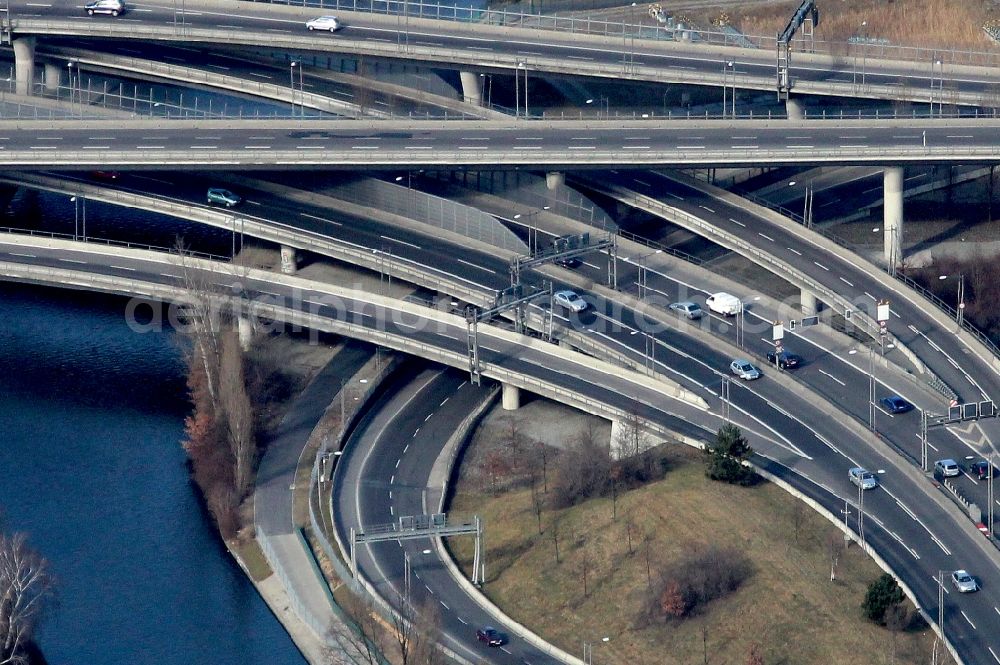 Aerial image Berlin - Course of the federal motorway A100 and A113 in the area of the exit Grenzallee in the Neukoelln part of Berlin in Germany