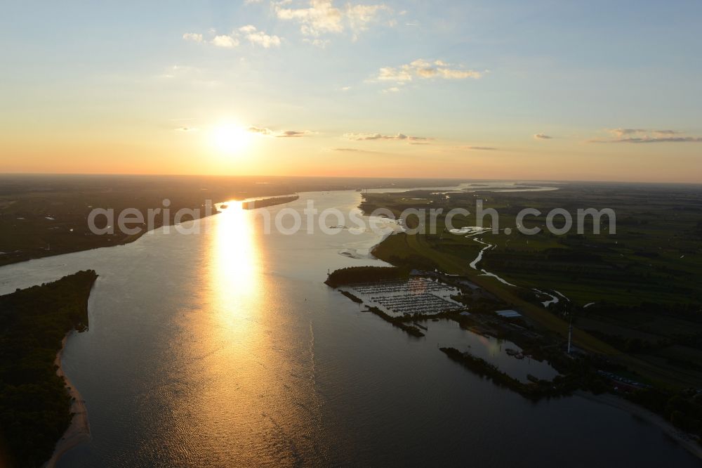 Wedel from the bird's eye view: Course of the river Elbe during sunset in Wedel in the state of Schleswig-Holstein