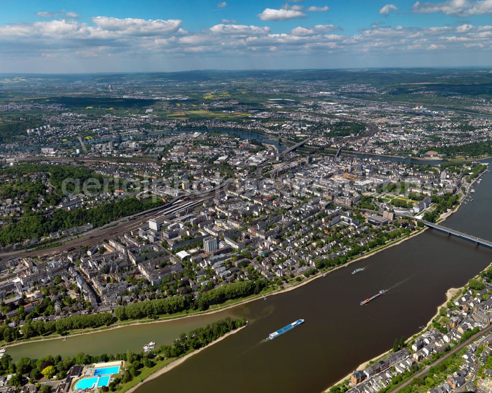 Aerial photograph Koblenz - The river Rhine in Koblenz in the state of Rhineland-Palatinate. The metropolitan area of Koblenz is one of the oldest cities in Germany. Parts of Koblenz belong to the UNESCO world heritage. The river separates the city. Bridges, ships and small islands mark the run of the river in the area