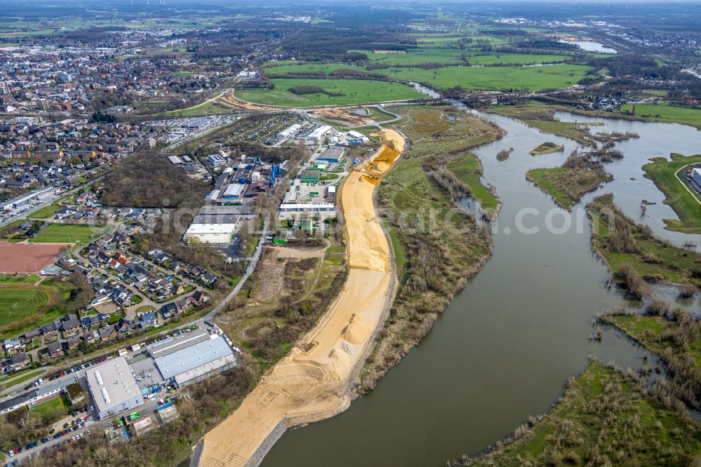 Aerial image Wesel - Construction site with earthworks for relocation, relocation and redesign of the shore areas along the mouth of the river Lippe in Wesel in the Ruhr area in the state of North Rhine-Westphalia, Germany