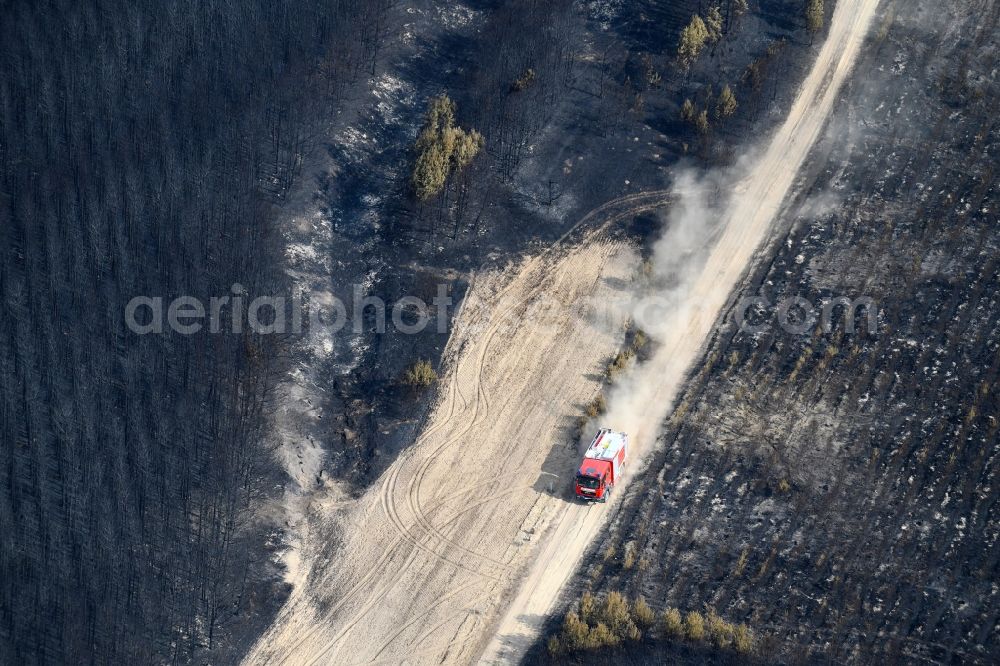 Aerial photograph Klausdorf - Damage by the Great Fire - destroyed forest fire tree population in a wooded area - forest terrain in Klausdorf in the state Brandenburg, Germany