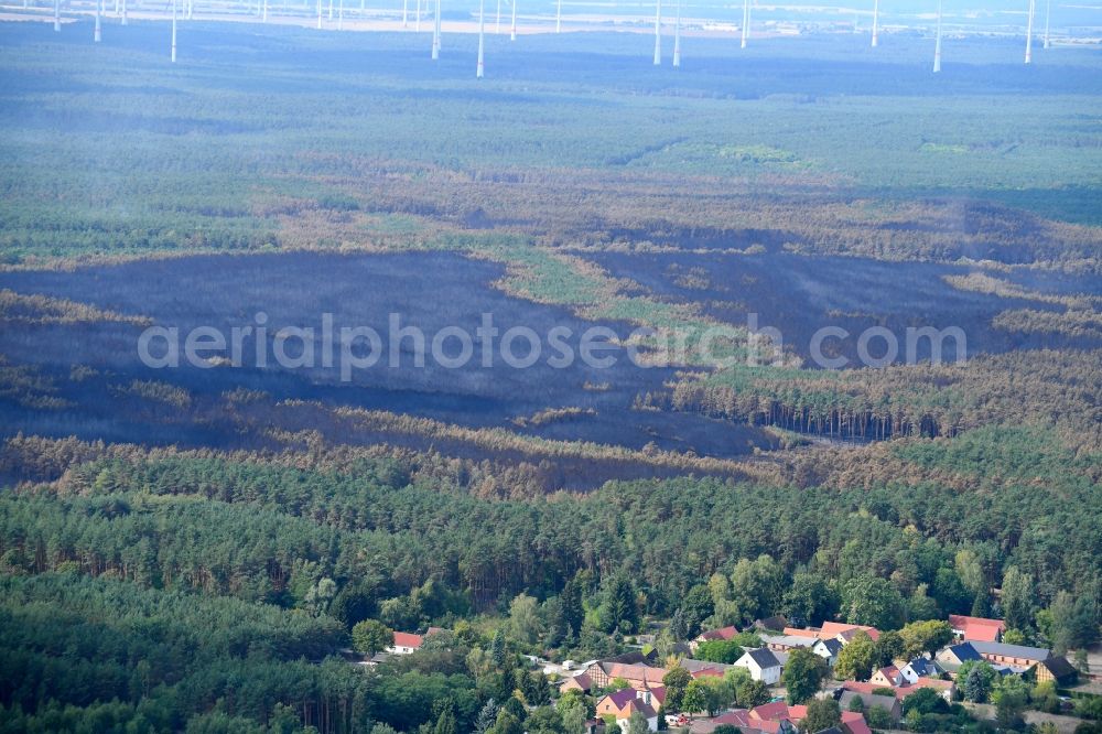 Klausdorf from the bird's eye view: Damage by the Great Fire - destroyed forest fire tree population in a wooded area - forest terrain in Klausdorf in the state Brandenburg, Germany