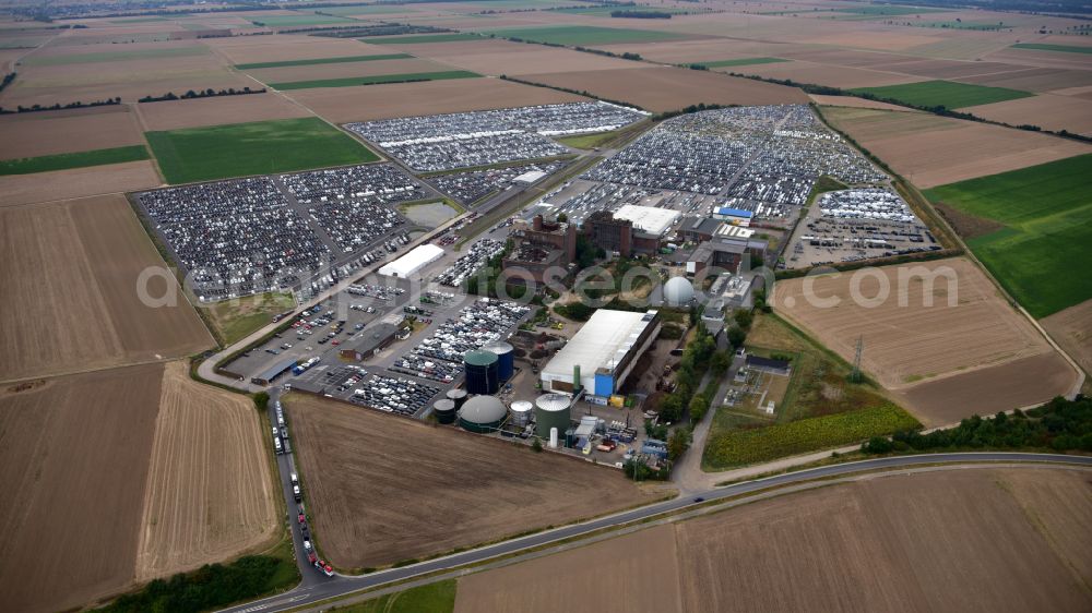 Zülpich from above - of the building complex of the distribution center and logistics center for new cars and new vehicles on the premises of CAT Germany GmbH on the B56 road in the district of Geich in Zuelpich in the state of North Rhine-Westphalia, Germany