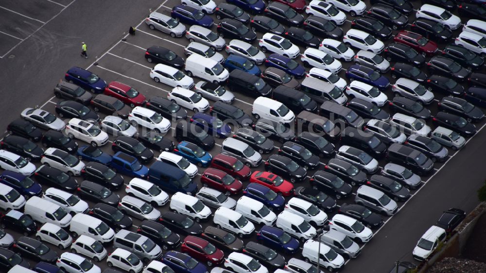 Aerial photograph Zülpich - of the building complex of the distribution center and logistics center for new cars and new vehicles on the premises of CAT Germany GmbH on the B56 road in the district of Geich in Zuelpich in the state of North Rhine-Westphalia, Germany