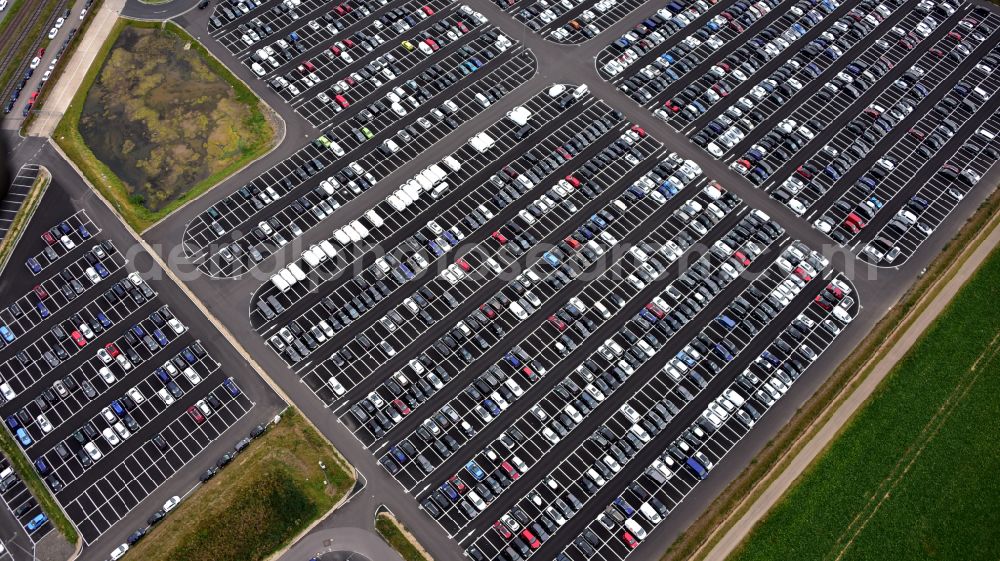 Zülpich from above - of the building complex of the distribution center and logistics center for new cars and new vehicles on the premises of CAT Germany GmbH on the B56 road in the district of Geich in Zuelpich in the state of North Rhine-Westphalia, Germany