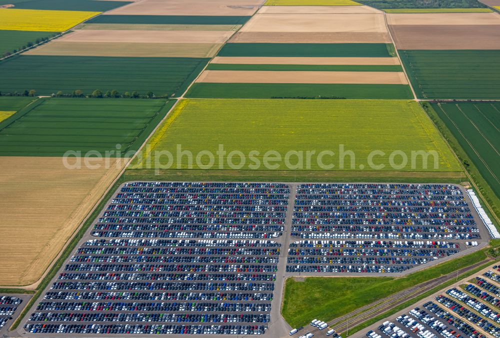 Zülpich from above - Of the building complex of the distribution center and logistics center for new cars and new vehicles on the premises of CAT Germany GmbH on the B56 road in the district of Geich in Zuelpich in the state of North Rhine-Westphalia, Germany