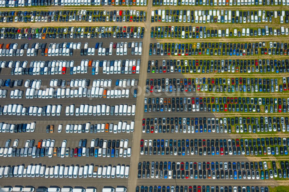 Aerial photograph Zülpich - Of the building complex of the distribution center and logistics center for new cars and new vehicles on the premises of CAT Germany GmbH on the B56 road in the district of Geich in Zuelpich in the state of North Rhine-Westphalia, Germany