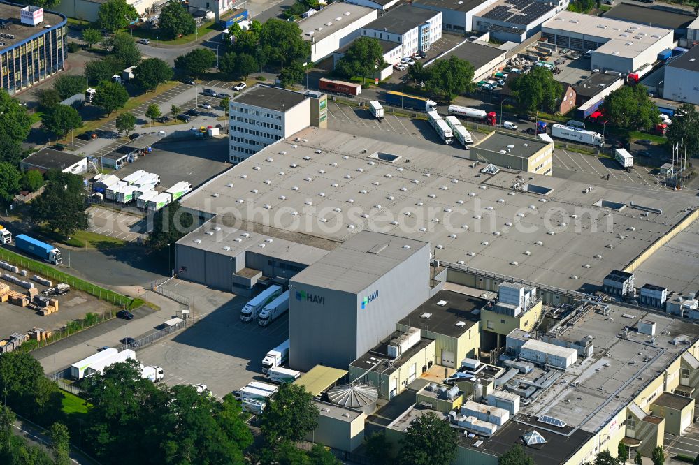 Duisburg from the bird's eye view: Corporate administration and building complex of the distribution center and logistics center on the premises of HAVI Logistics on Hochstrasse in the Bergheim district of Duisburg in the Ruhr area in the federal state of North Rhine-Westphalia, Germany