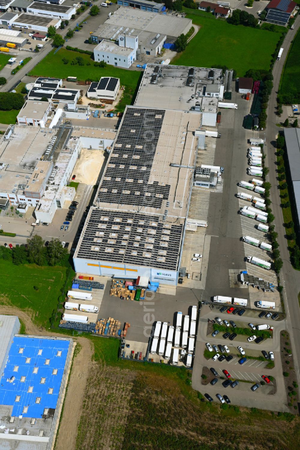 Aerial photograph Günzburg - Building complex of the distribution center and food logistics center on the premises of HAVI Logistics on Max-Planck-Strasse in the Oberelchingen district of Guenzburg in the state of Bavaria, Germany