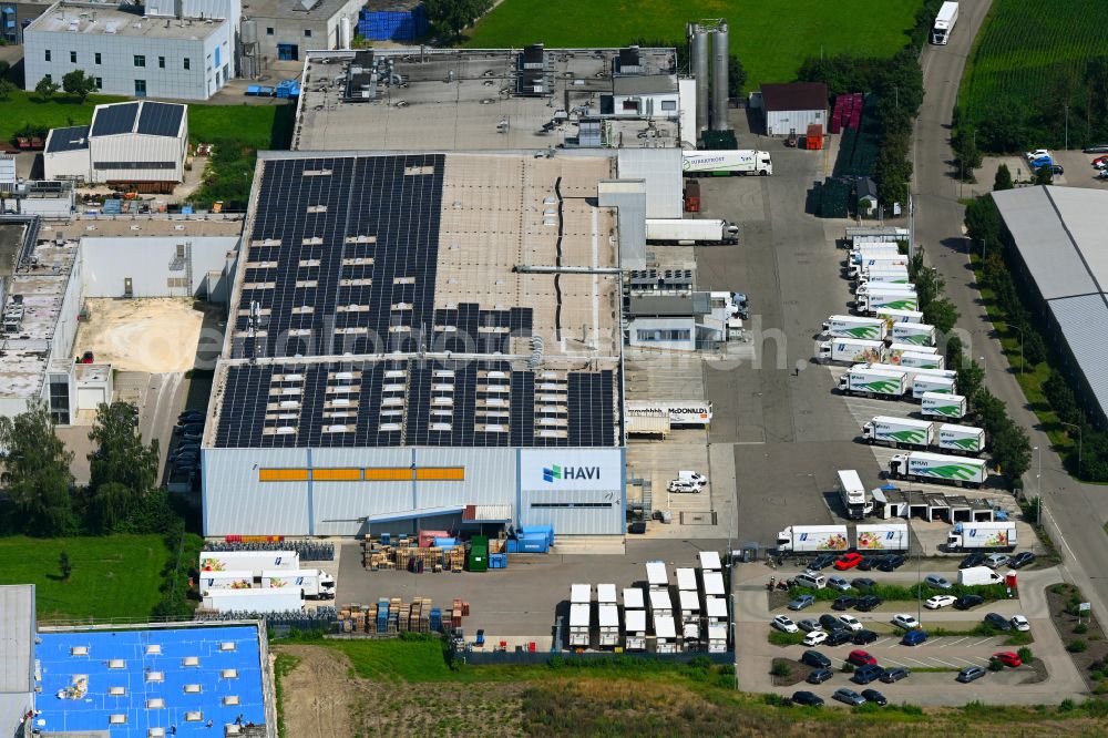 Aerial photograph Günzburg - Building complex of the distribution center and food logistics center on the premises of HAVI Logistics on Max-Planck-Strasse in the Oberelchingen district of Guenzburg in the state of Bavaria, Germany