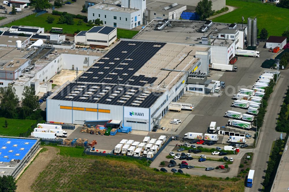 Günzburg from above - Building complex of the distribution center and food logistics center on the premises of HAVI Logistics on Max-Planck-Strasse in the Oberelchingen district of Guenzburg in the state of Bavaria, Germany