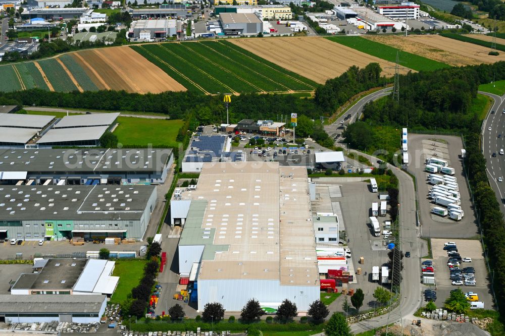 Aerial photograph Ilsfeld - Building complex of the distribution center and food logistics center on the premises of HAVI Logistics on Porschestrasse in the Auenstein district of Ilsfeld in the state of Baden-Wuerttemberg, Germany