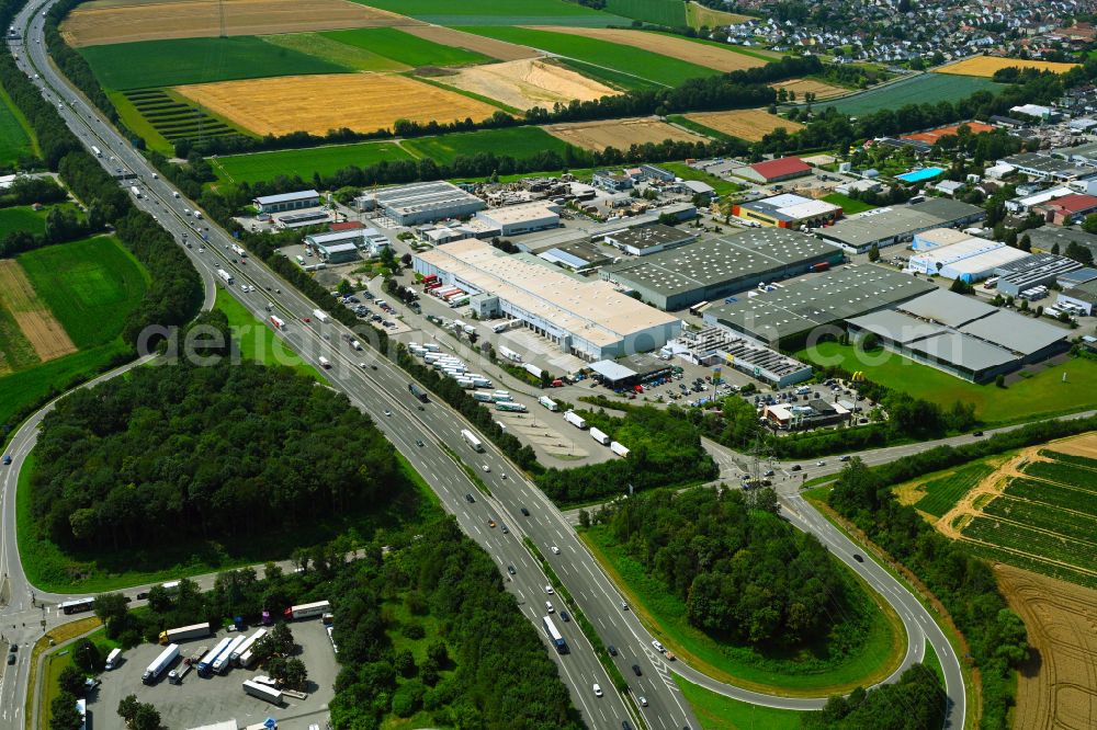 Ilsfeld from above - Building complex of the distribution center and food logistics center on the premises of HAVI Logistics on Porschestrasse in the Auenstein district of Ilsfeld in the state of Baden-Wuerttemberg, Germany