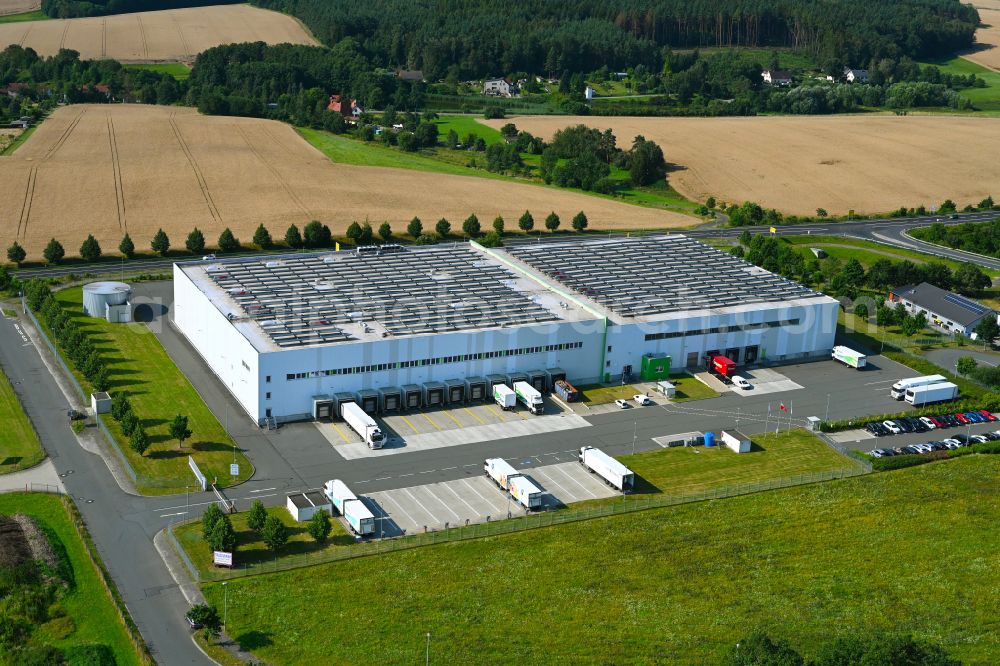 Aerial photograph Lederhose - Building complex and distribution center on the site fuer Lebensmittel of HAVI Logistics on street Eichenstrasse in the district Kolba in Lederhose in the state Thuringia, Germany