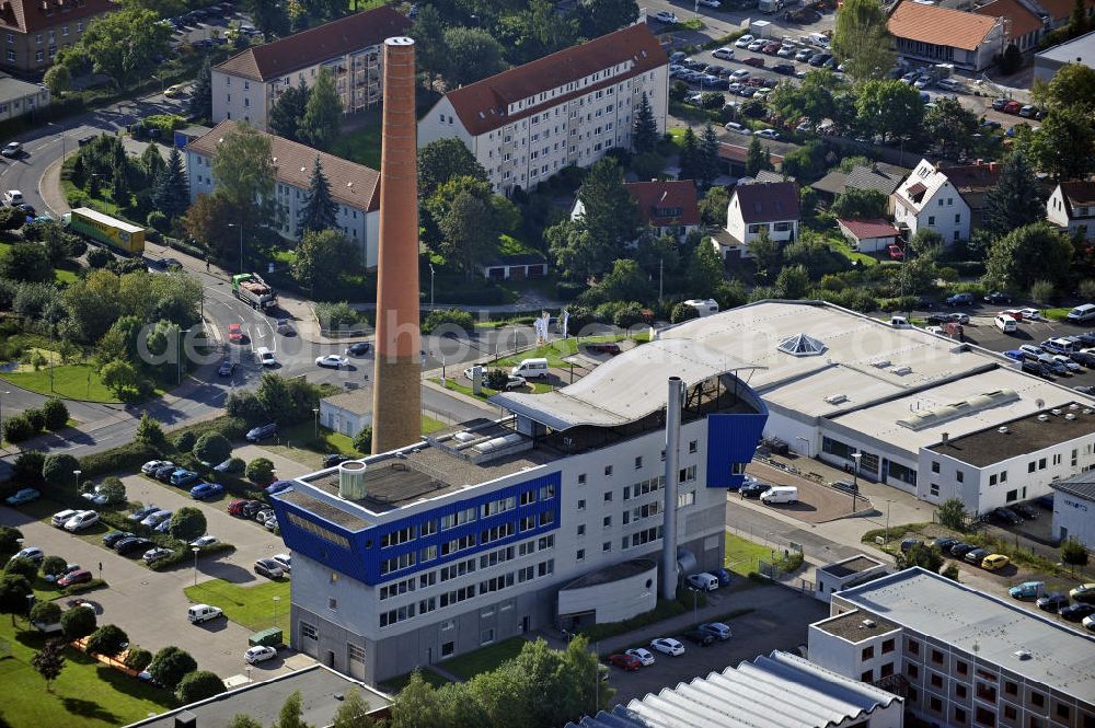 Eisenach from the bird's eye view: Das Verwaltungsgebäude der Eisenacher Versorgungs-Betriebe GmbH An der Feuerwache. Das Gebäude entstand 1998 durch den Umbau des Gasturbinen-Heizkraftwerkes. The administration building of the Eisenacher Versorgungs-Betriebe GmbH.