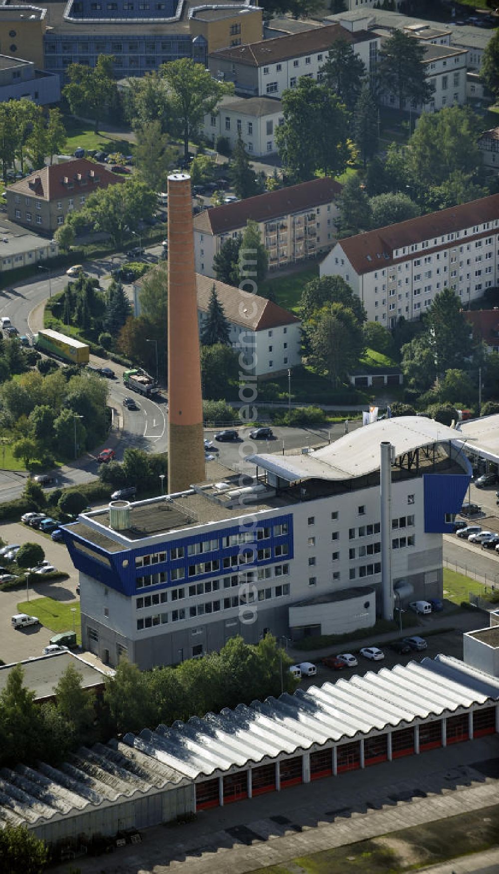 Aerial photograph Eisenach - Das Verwaltungsgebäude der Eisenacher Versorgungs-Betriebe GmbH An der Feuerwache. Das Gebäude entstand 1998 durch den Umbau des Gasturbinen-Heizkraftwerkes. The administration building of the Eisenacher Versorgungs-Betriebe GmbH.