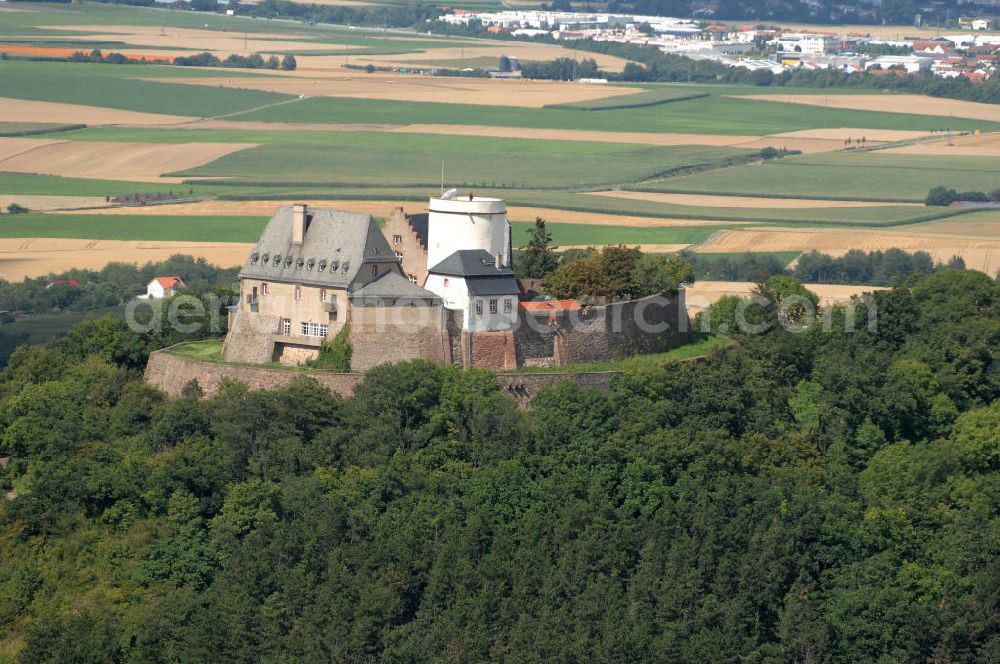 Aerial photograph Otzberg - Blick auf die Veste Otzberg. Gebaut wurde sie Ende des 12. Jahrhunderts auf dem 368 m hohen Gipfel des Otzberg im Odenwald, durch den Abt Marquard I. von Fulda. Im 20. Jahrhundert wurde es unter an derem als Jugendherberge, Forststelle und Gaststätte genutzt. Im Jahr 1985 zog das Museum sammlung zur Volkskunde in Hessen ein und seit 1996 wird es als Museum und Standesamt genutzt. Kontakt: Veste Otzberg, Burgweg 28, 64853 Otzberg, Tel. 06162 / 9152976,