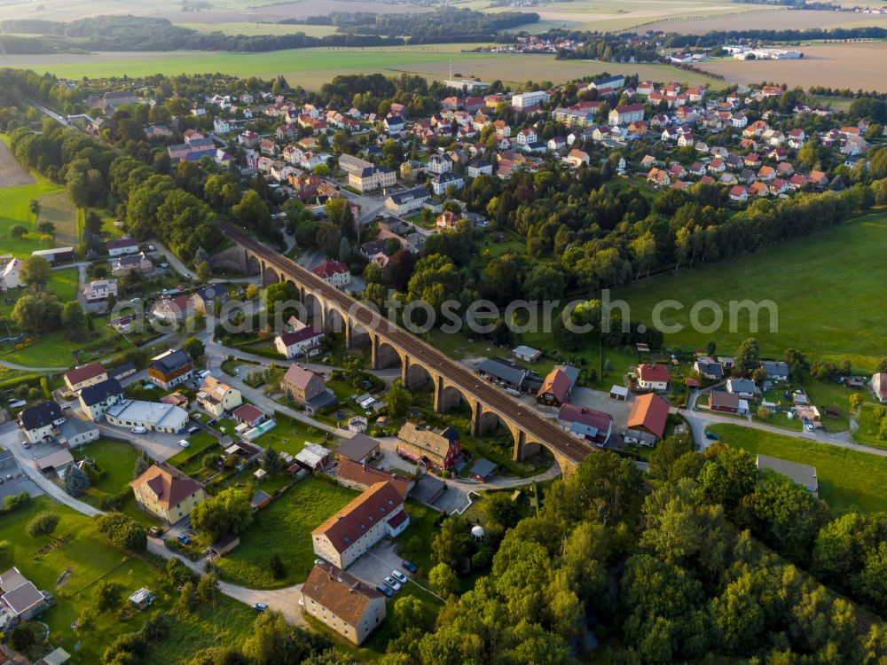 Demitz-Thumitz from the bird's eye view: Viaduct of the railway bridge structure to route the railway tracks on street Hauptstrasse in Demitz-Thumitz in the state Saxony, Germany