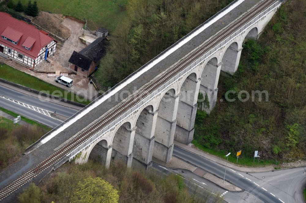 Greene from the bird's eye view: Viaduct of the railway bridge structure to route the railway tracks in Greene in the state Lower Saxony