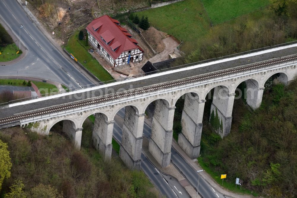 Greene from above - Viaduct of the railway bridge structure to route the railway tracks in Greene in the state Lower Saxony