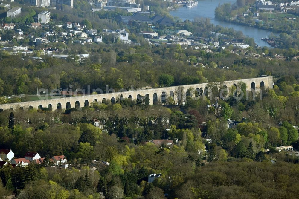 Marly-le-Roi from above - Viaduct of the railway bridge structure to route the railway tracks in Marly-le-Roi in Ile-de-France, France