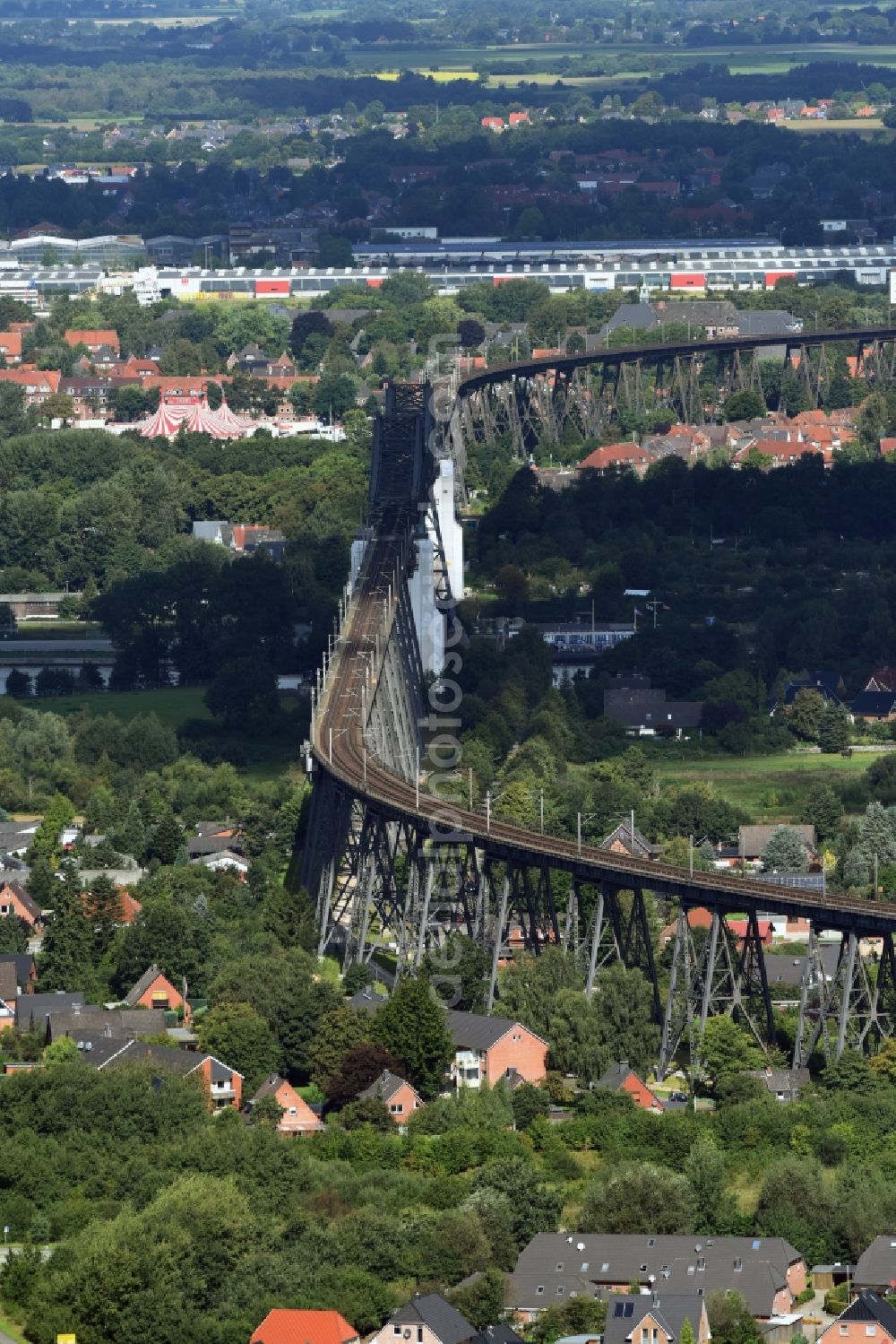 Osterrönfeld from the bird's eye view: Viaduct of the railway bridge structure to route the railway tracks in Osterroenfeld in the state Schleswig-Holstein