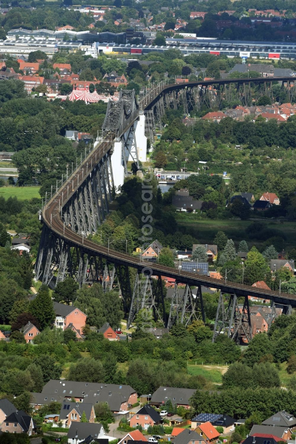 Osterrönfeld from the bird's eye view: Viaduct of the railway bridge structure to route the railway tracks in Osterroenfeld in the state Schleswig-Holstein