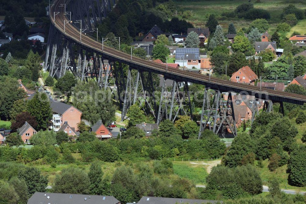 Osterrönfeld from the bird's eye view: Viaduct of the railway bridge structure to route the railway tracks in Osterroenfeld in the state Schleswig-Holstein