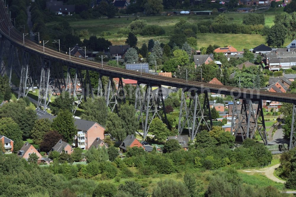 Osterrönfeld from above - Viaduct of the railway bridge structure to route the railway tracks in Osterroenfeld in the state Schleswig-Holstein