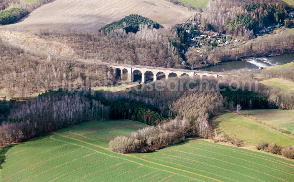 Wechselburg from above - Viaduct of the railway bridge structure to route the railway tracks in Wechselburg in the state Saxony, Germany