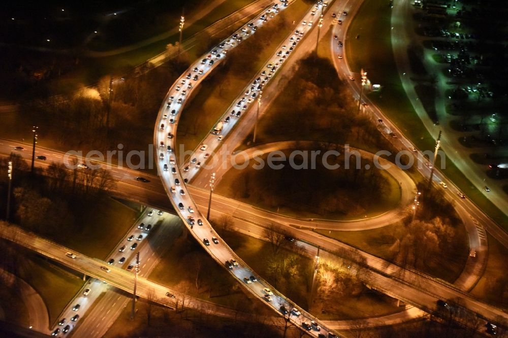 München from the bird's eye view: Night aerial view from the traffic on the viaduct of the expressway at the Georg-Brauchle-Ring in Munich in Bavaria