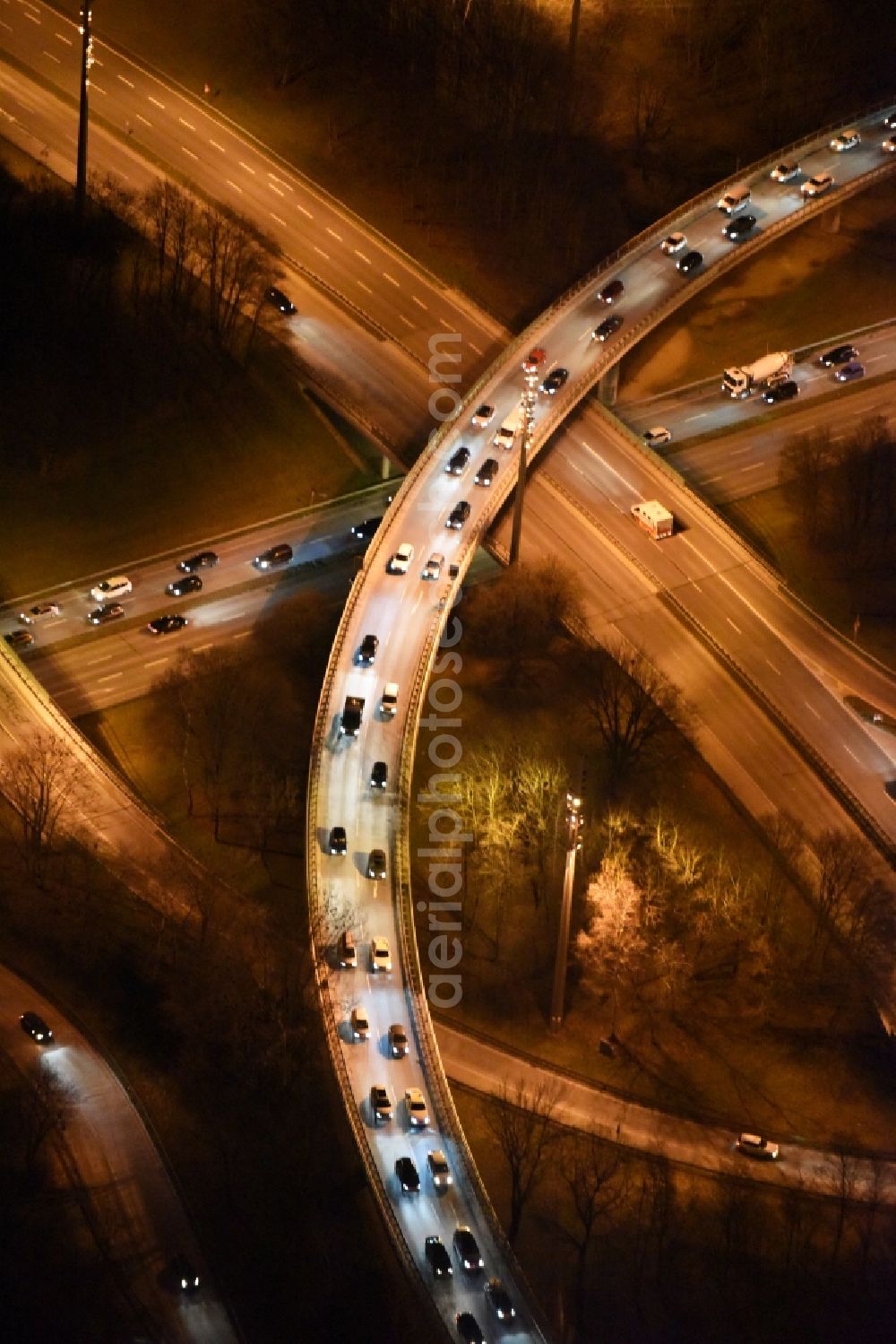 München from above - Night aerial view from the traffic on the viaduct of the expressway at the Georg-Brauchle-Ring in Munich in Bavaria