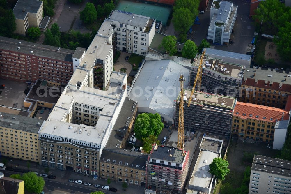 Aerial image Berlin - Victoriahof and construction site on Koepnicker Strasse in the Mitte district of Berlin in Germany. Victoriahof is listed as a protected building with 5 and 6 storeys and three courtyards. It belongs to Steletzki Group. Other residential and business buildings as well as a construction site are located around it