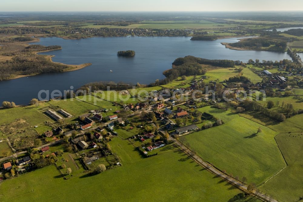 Vipperow from above - The municipality Vipperow along the Dorfstrasse and the Solzower Strasse on the Kleine Müritz in the state Mecklenburg-Western Pomerania. It is a part of Mecklenburg Lake District