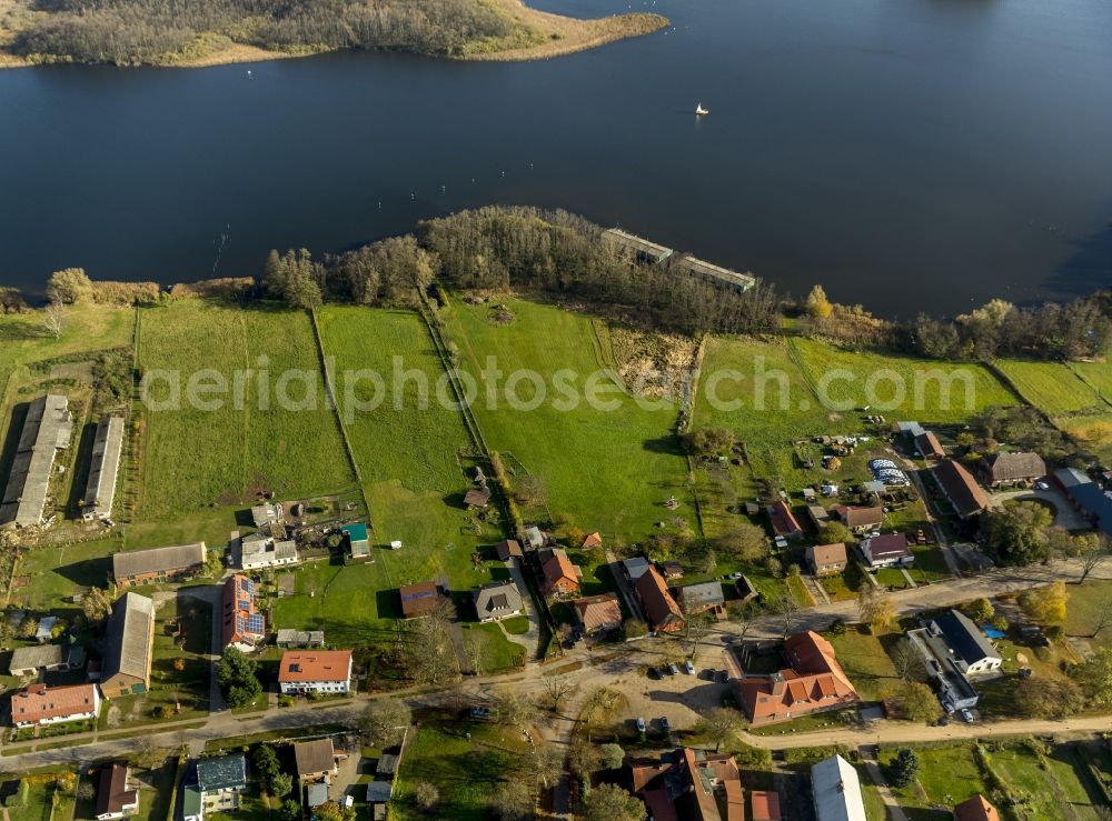 Aerial photograph Vipperow - The municipality Vipperow along the Dorfstrasse and the Solzower Strasse on the Kleine Müritz in the state Mecklenburg-Western Pomerania. It is a part of Mecklenburg Lake District