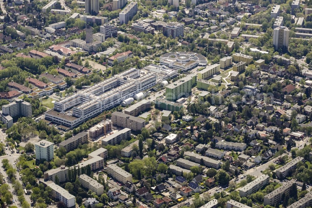 Berlin from above - Vivantes Hospital Neukoelln in the Britz neighborhood of Berlin, Germany. The hospital at the Rudower Strasse is an academic teaching hospital by the Charité-Universitaetsmedizin Berlin. The building was designed by architect Reinhold Kiehl