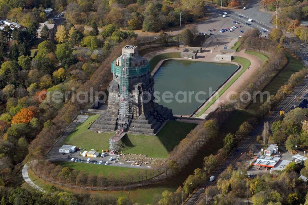 Leipzig from the bird's eye view: Blick auf die Bauarbeiten am Völkerschlachtdenkmal in der Prager Straße, 04299 Leipzig - Tel.: 0341/8 78 04 71 - Fax: 0341/8 78 04 71 - E-Mail: Voelkerschlachtdenkmal.Leipzig@t-online.de - Ansprechpartner: Steffen Poser Achim Walder: