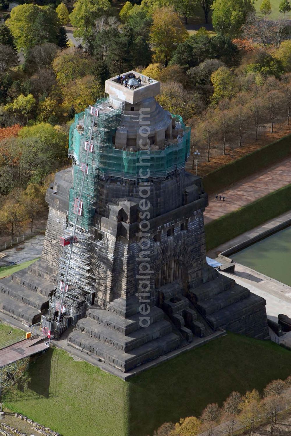 Leipzig from the bird's eye view: Blick auf die Bauarbeiten am Völkerschlachtdenkmal in der Prager Straße, 04299 Leipzig - Tel.: 0341/8 78 04 71 - Fax: 0341/8 78 04 71 - E-Mail: Voelkerschlachtdenkmal.Leipzig@t-online.de - Ansprechpartner: Steffen Poser Achim Walder: