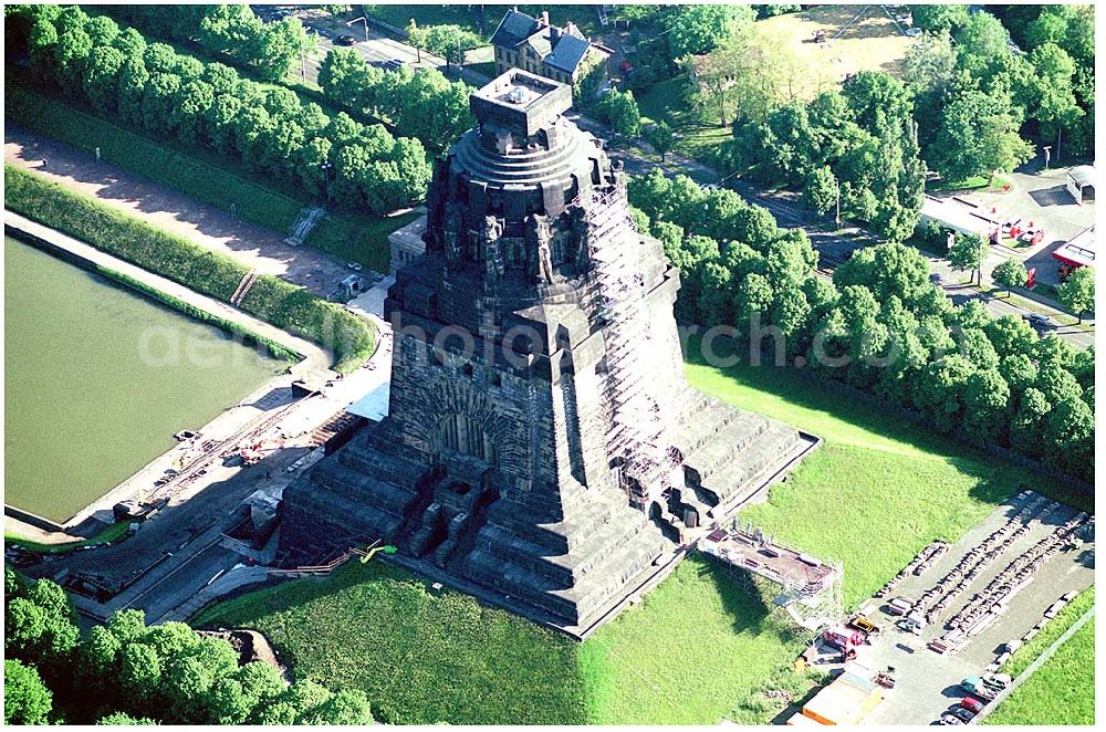 Leipzig from the bird's eye view: 27.05.04 Blick auf das Völkerschlachtdenkmal in Leipzig. Es erinnert an die erste große Massenschlacht der Menschheitsgeschichte. Im Jahre 1913 wurde das Völkerschlachtdenkmal von Kaiser Wilhelm II. in Anwesenheit des sächsischen Königs und weiterer Fürsten deutscher Staaten sowie der Vertreter Österreichs, Rußlands und Schwedens eingeweiht. Anschrift: Prager Straße, 04299 Leipzig Tel/Fax: +49 (0)341 8 78 04 71 Email: voelkerschlachtdenkmal.leipzig@t-online.de Leiter: Steffen Poser