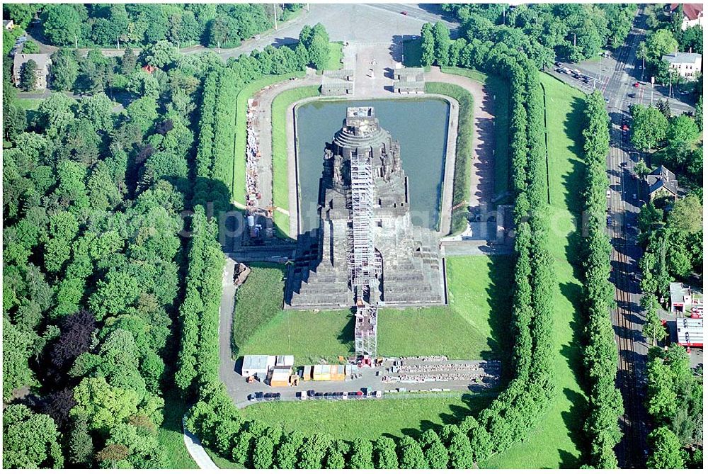 Aerial photograph Leipzig - 27.05.04 Blick auf das Völkerschlachtdenkmal in Leipzig. Es erinnert an die erste große Massenschlacht der Menschheitsgeschichte. Im Jahre 1913 wurde das Völkerschlachtdenkmal von Kaiser Wilhelm II. in Anwesenheit des sächsischen Königs und weiterer Fürsten deutscher Staaten sowie der Vertreter Österreichs, Rußlands und Schwedens eingeweiht. Anschrift: Prager Straße, 04299 Leipzig Tel/Fax: +49 (0)341 8 78 04 71 Email: voelkerschlachtdenkmal.leipzig@t-online.de Leiter: Steffen Poser