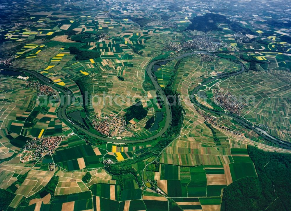 Aerial photograph Volkach - Volkach in the Lower Franconia region of the state of Bavaria. The city is located on the river Main in the main-franconian winery region. The river forms a horseshoebend before reaching the city between fields