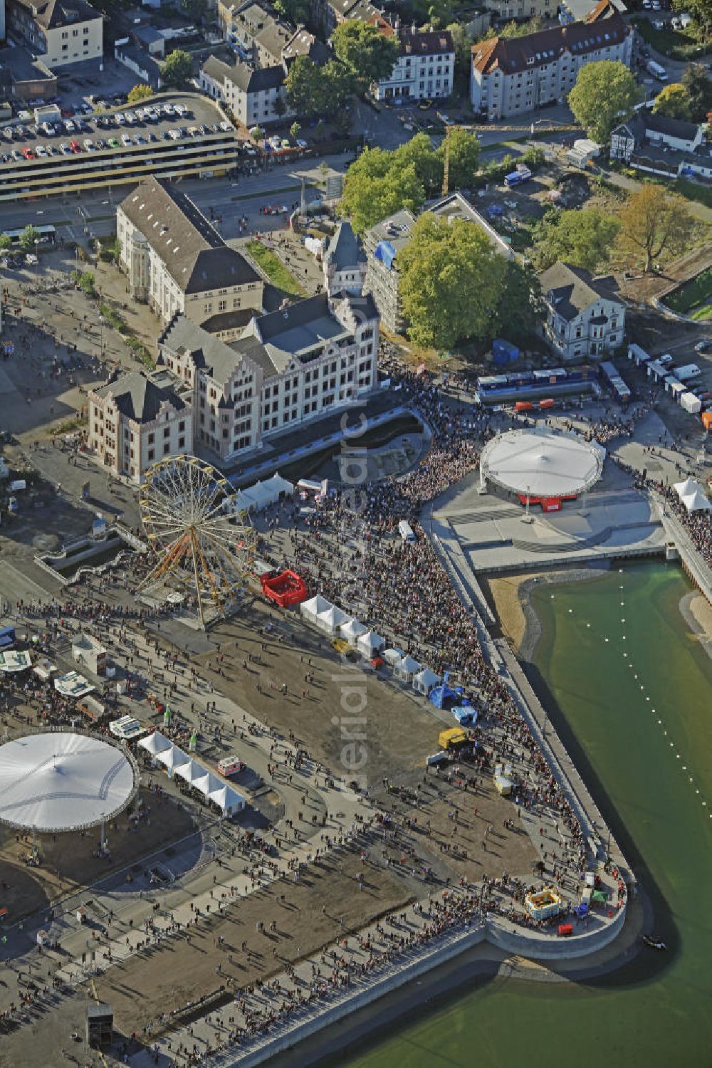 Dortmund from above - Volksfest an der Hörder Burg zur Flutung des Phoenix-Sees. Festival at the Castle Horde in celebration of the flooding of the Lake Phoenix.