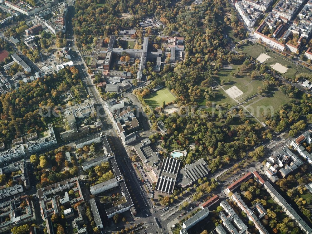 Berlin from above - Urban Park Volkspark Friedrichshain in the Friedrichshain part of Berlin. The Vivantes clinic hospital (in the background) and the recreational and sports centre SEZ (in the foreground) are located on Landsberger Allee. The urban park was the first communal park of the city