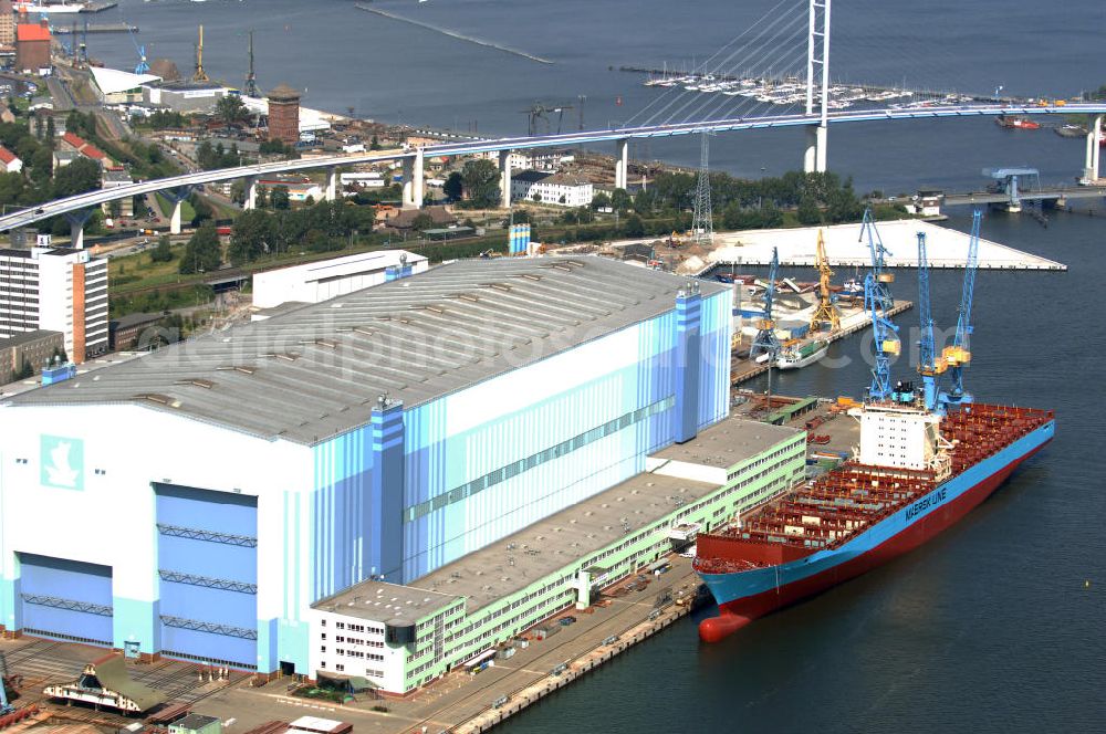 Aerial image STRALSUND - Blick auf die Volkswerft / Werft Stralsund. Die Volkswerft ist in der Lage, standardisierte oder hoch angepasste Spezialschiffe zu entwickeln und zu bauen. Die Volkswerft bietet eine breite Palette von Containerschiffen bis zur Panmax-Größe mit einer Container-Kapazität bis 4000 TEU. Kontakt: An der Werft 5, 18439 Stralsund, Tel. 03831 660, Fax 03831 663202, E-Mail: info@volkswerft.de,