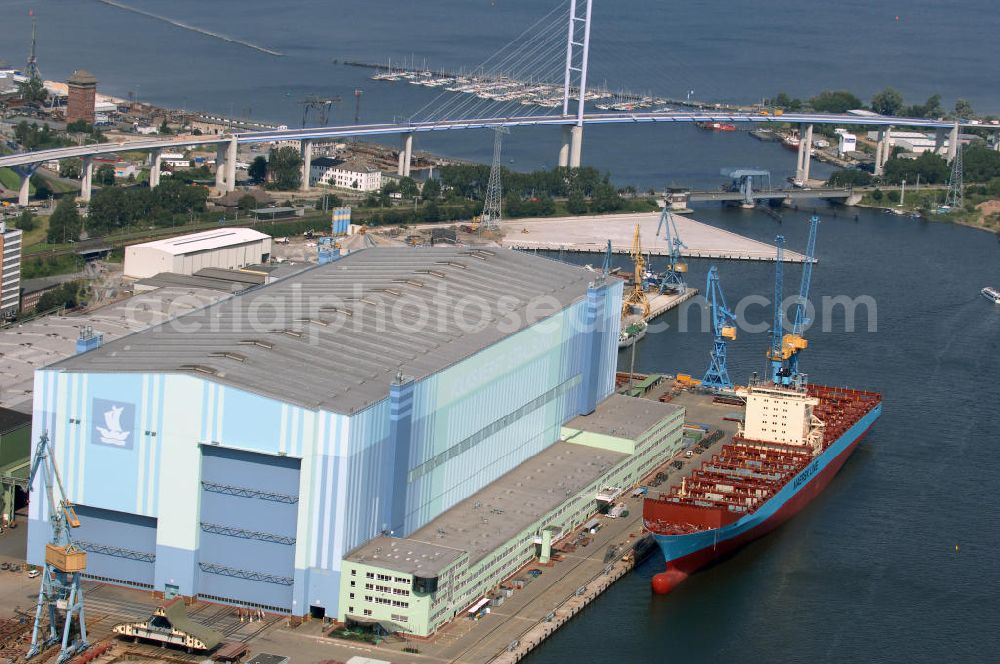 Aerial photograph STRALSUND - Blick auf die Volkswerft / Werft Stralsund. Die Volkswerft ist in der Lage, standardisierte oder hoch angepasste Spezialschiffe zu entwickeln und zu bauen. Die Volkswerft bietet eine breite Palette von Containerschiffen bis zur Panmax-Größe mit einer Container-Kapazität bis 4000 TEU. Kontakt: An der Werft 5, 18439 Stralsund, Tel. 03831 660, Fax 03831 663202, E-Mail: info@volkswerft.de,