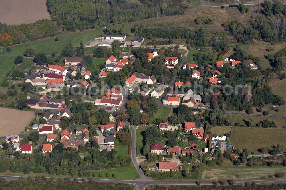 Pödelwitz from the bird's eye view: View of the village Poedelwitz at the coal mine Schleenhain in the state Saxony